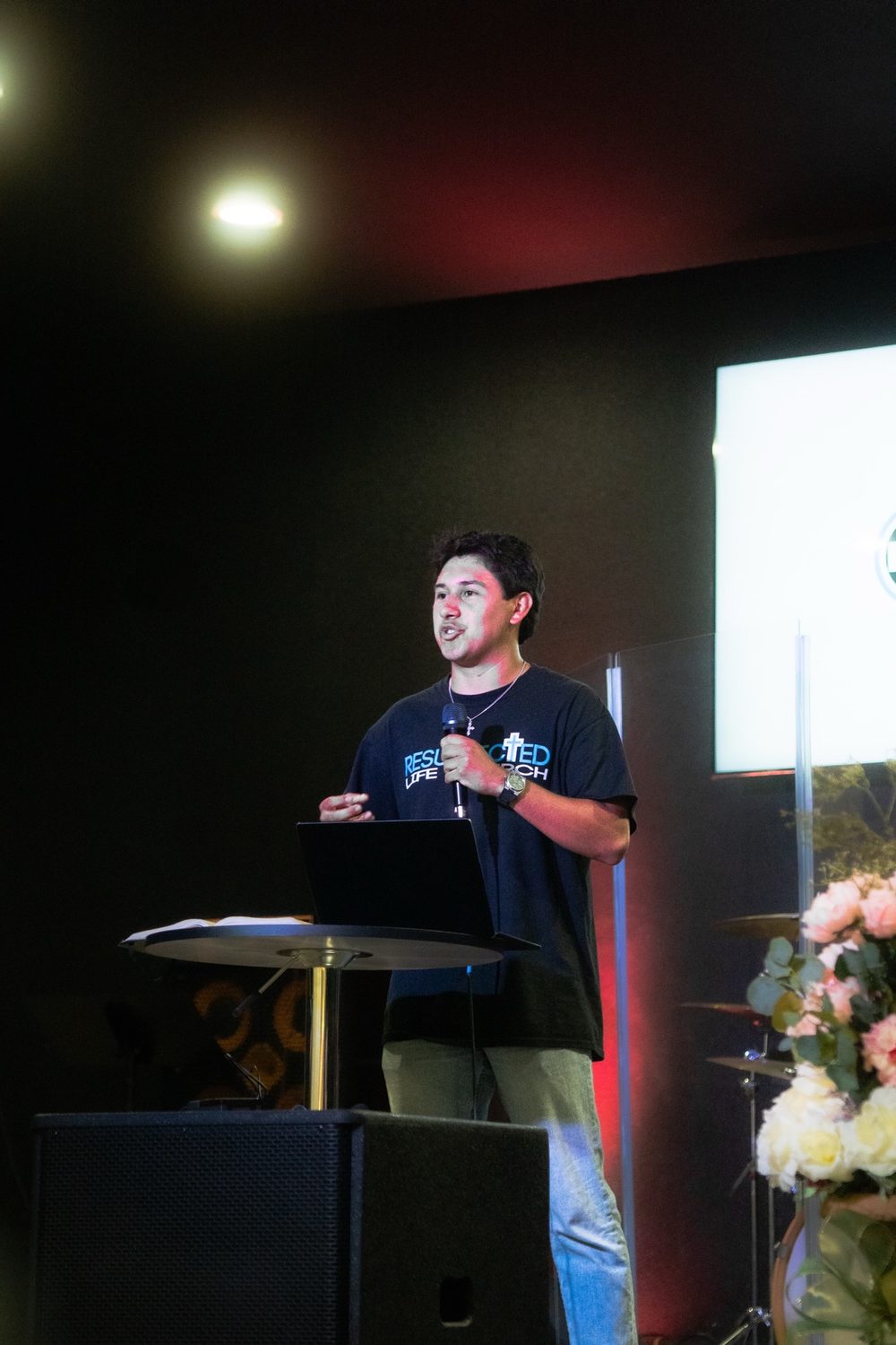 Tristan speaking at church